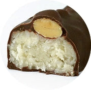 Cut piece of a Mahalo bar showing the coconut and almond