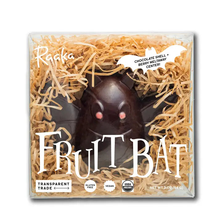 Raaka Vegan/Dairy Free Chocolate fruit bat in a clear box with straw-like material on a white background